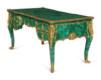 A Louis XV Style Gilt Bronze Mounted Malachite Bureau Plat