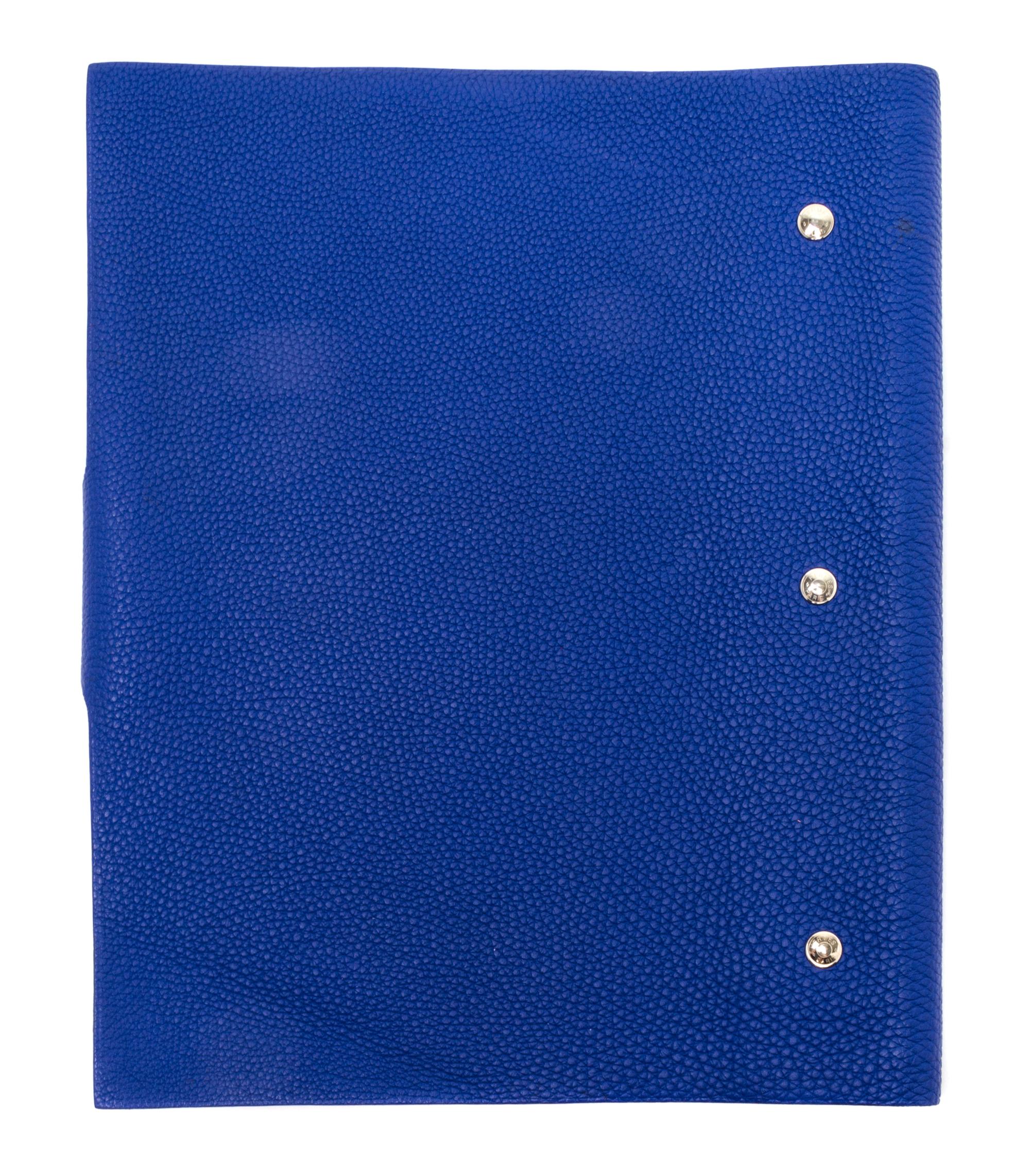 An Hermes Bleu Electrique Togo Ulysse MM Notebook Cover, 9" x 7.5".