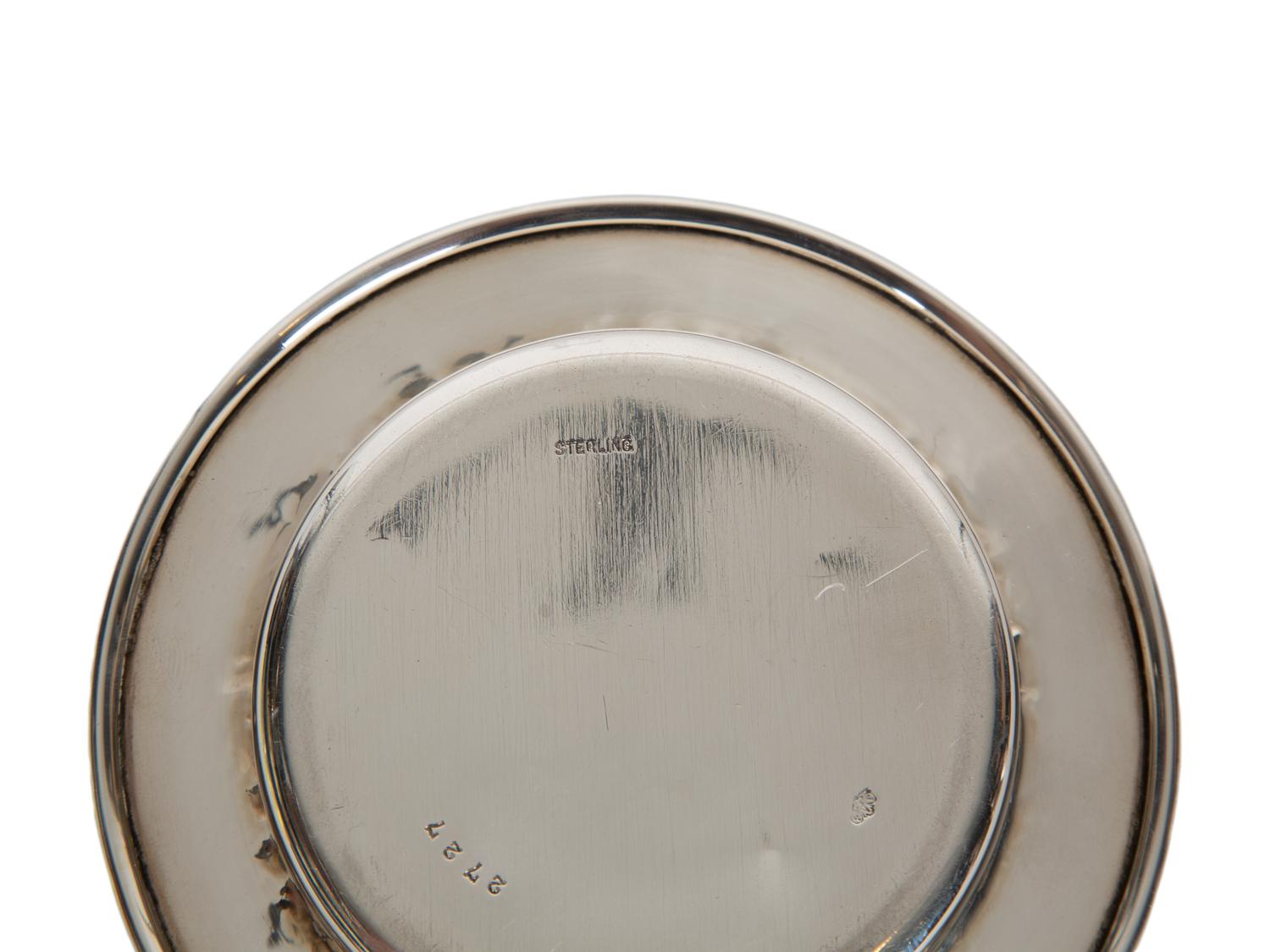 A Garrard & Co Silvered Figural Standing Salt and an Asprey Silver Bonnie Doon Commemorative Ashtray
