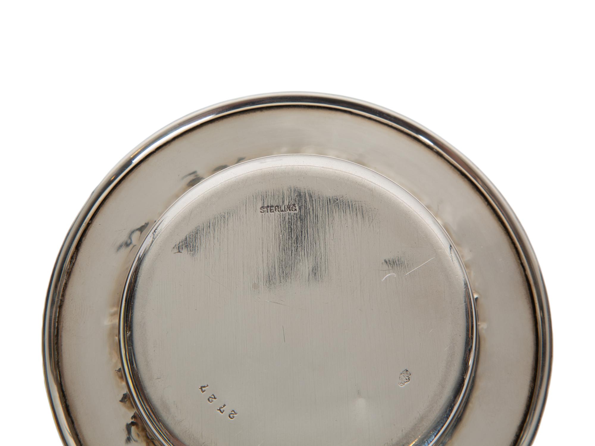 A Garrard & Co Silvered Figural Standing Salt and an Asprey Silver Bonnie Doon Commemorative Ashtray