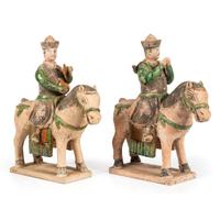 A Pair of Terracotta Equestrian Musician Figures