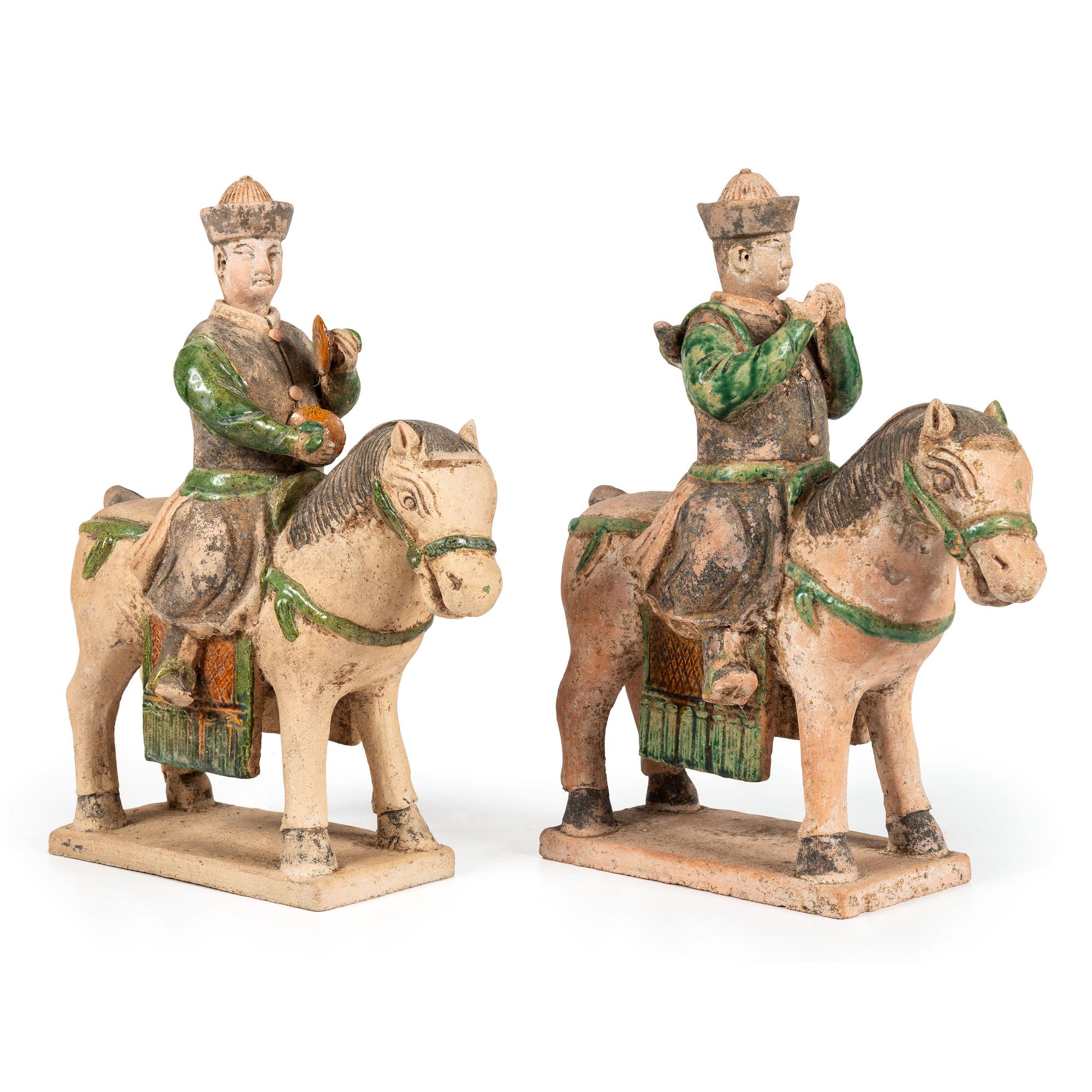 A Pair of Terracotta Equestrian Musician Figures