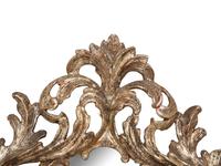 An Italian Baroque Style Silvered Wood Mirror