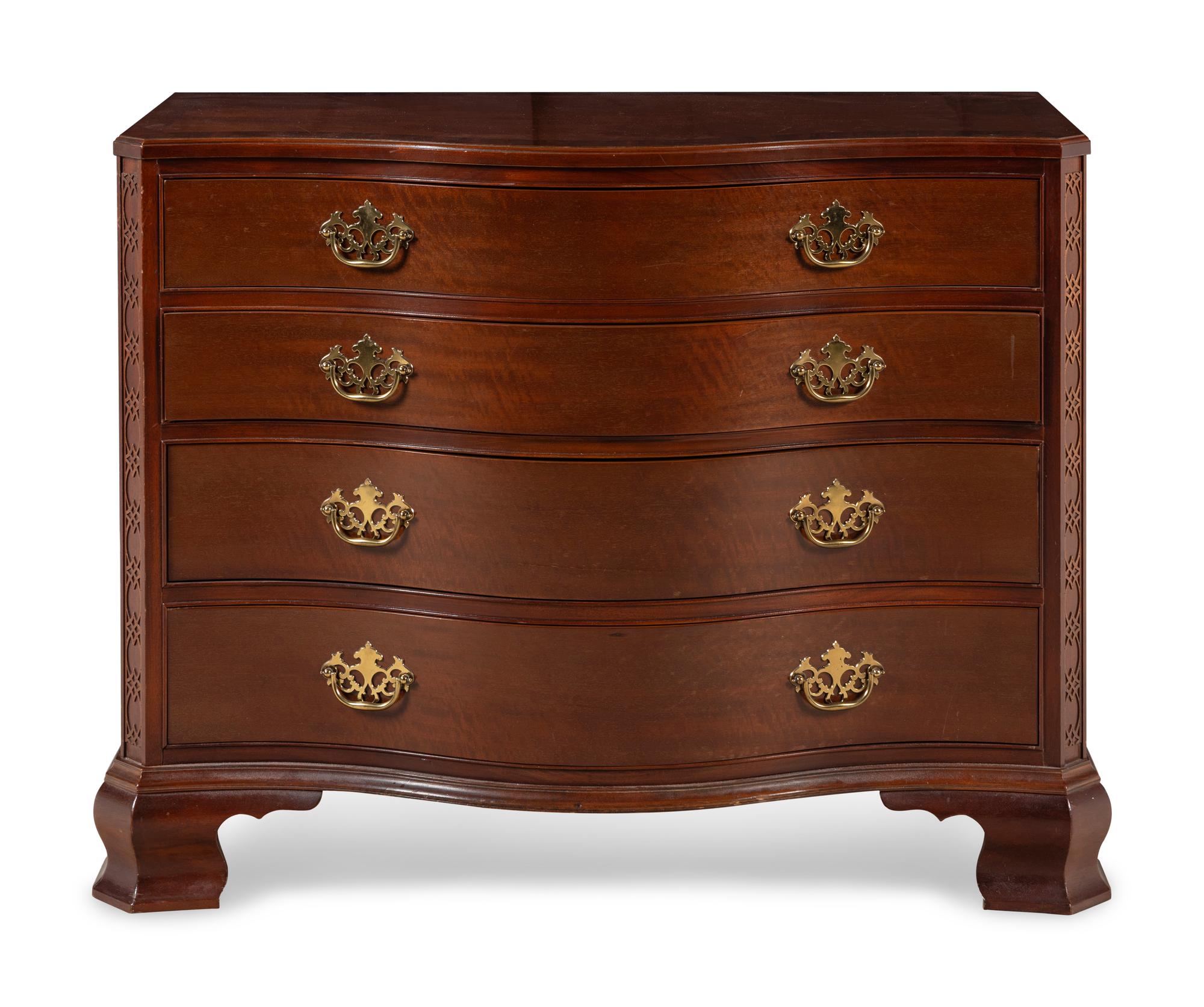 A Pair of George III Style Mahogany Serpentine-Front Chests of Drawers