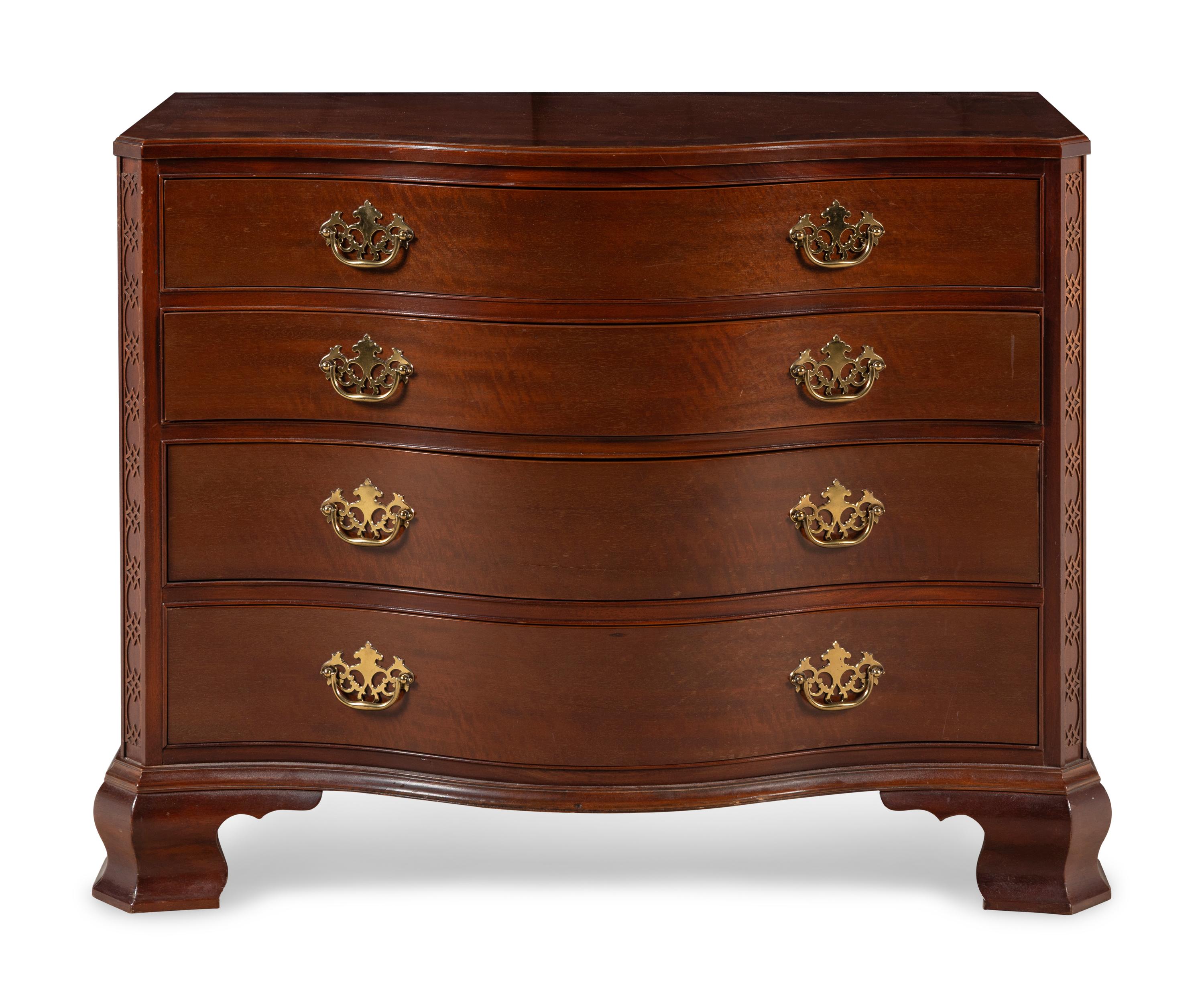 A Pair of George III Style Mahogany Serpentine-Front Chests of Drawers
