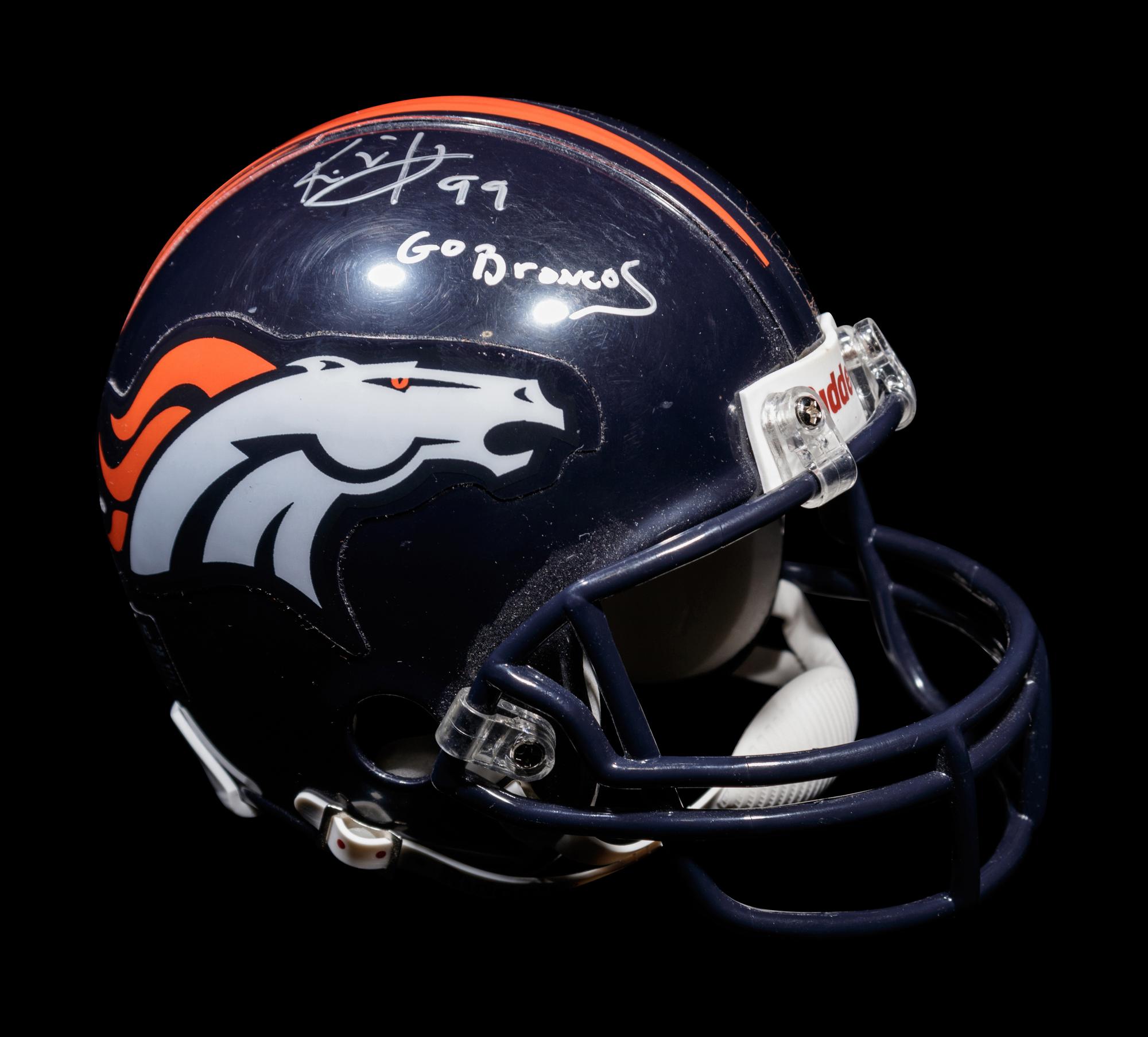 A Group of Denver Broncos Items (Including Tim Tebow),