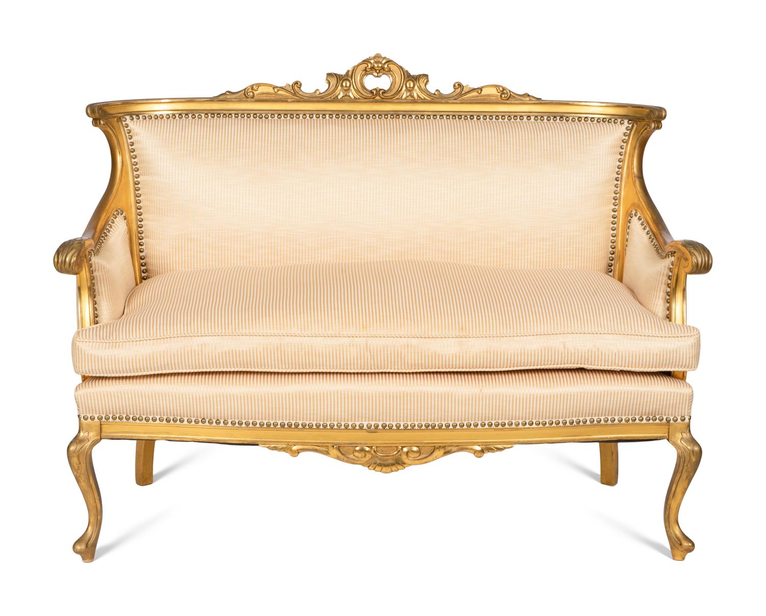 A Victorian Louis XV Style Giltwood Three-Piece Parlor Suite