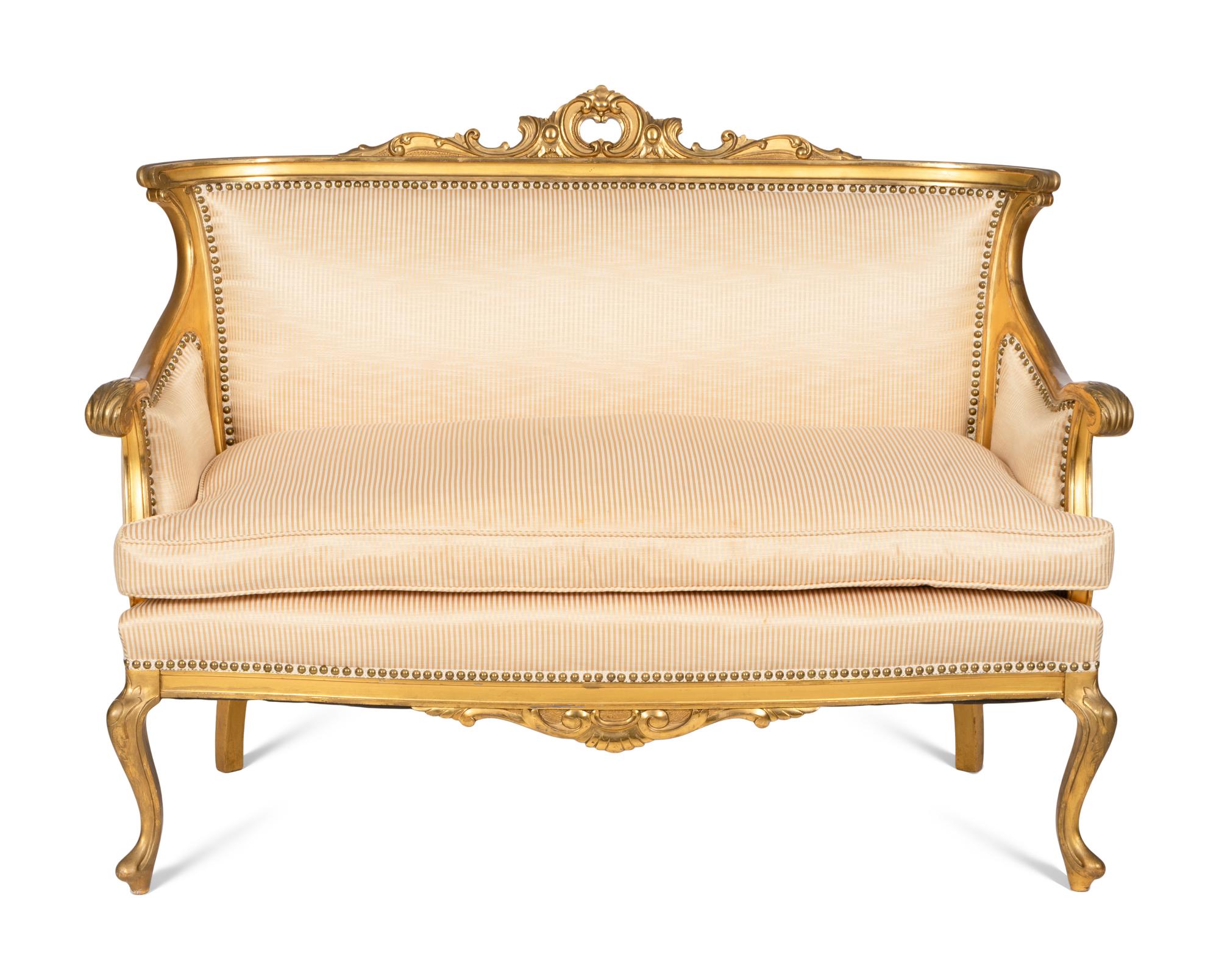 A Victorian Louis XV Style Giltwood Three-Piece Parlor Suite