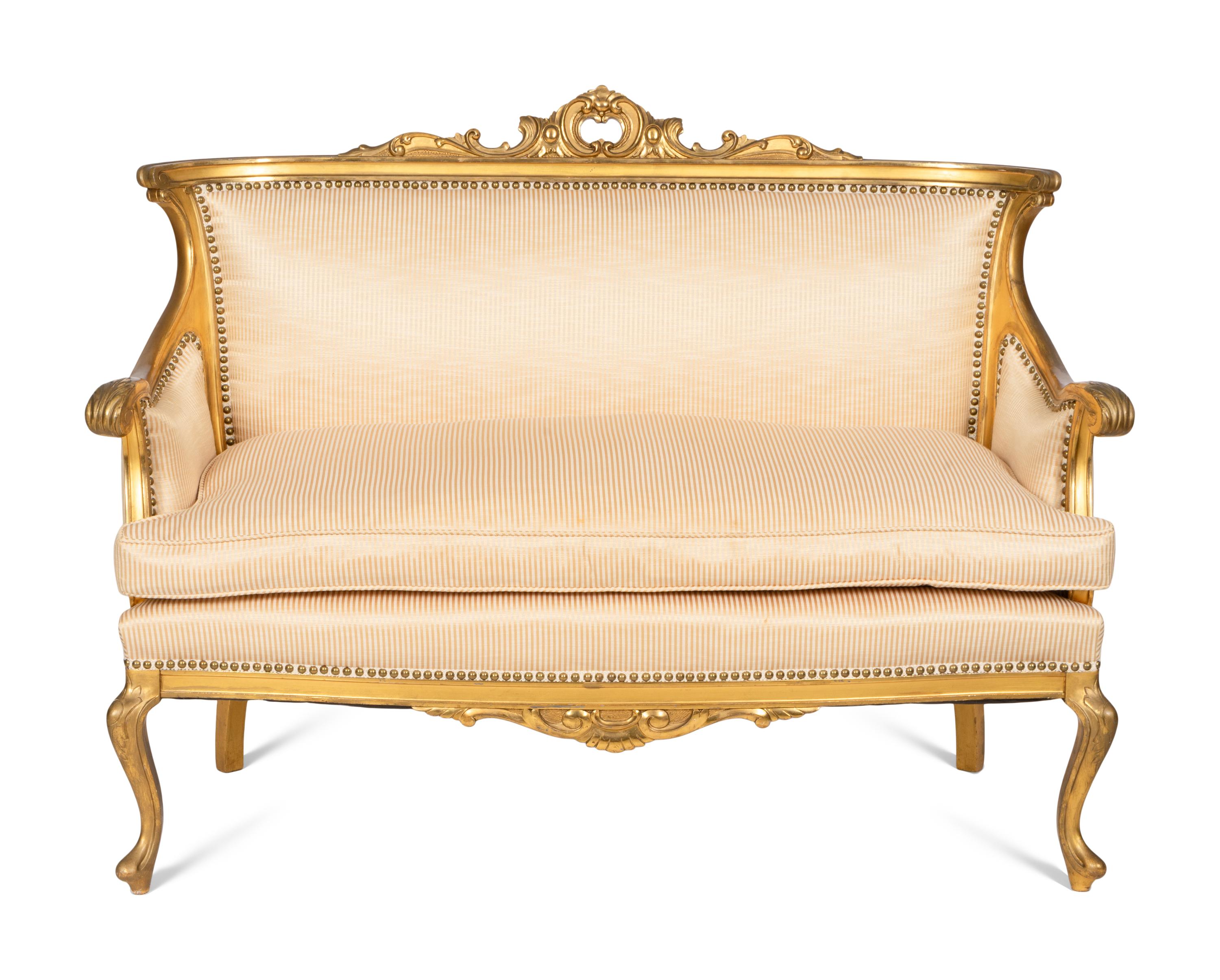 A Victorian Louis XV Style Giltwood Three-Piece Parlor Suite