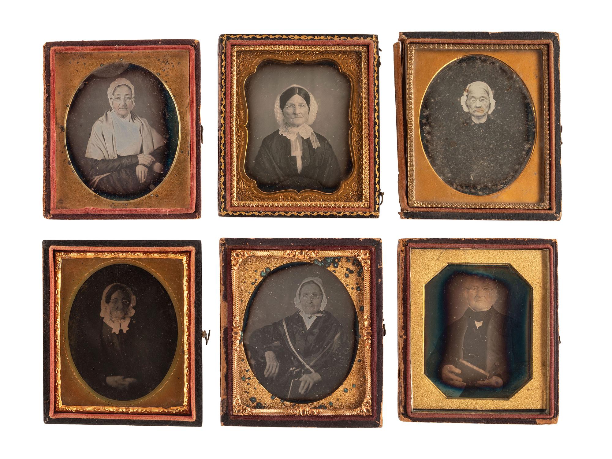 [EARLY PHOTOGRAPHY]. A group of 23 daguerreotype and tintype portraits of subjects with glasses, including: