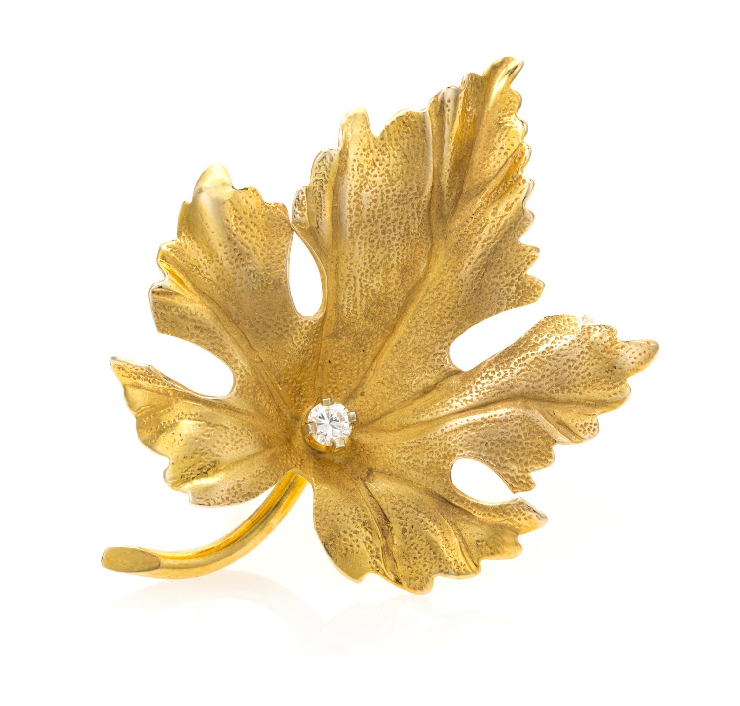 A Yellow Gold and Diamond Maple Leaf Brooch, Tiffany & Co., 1.80 dwts.