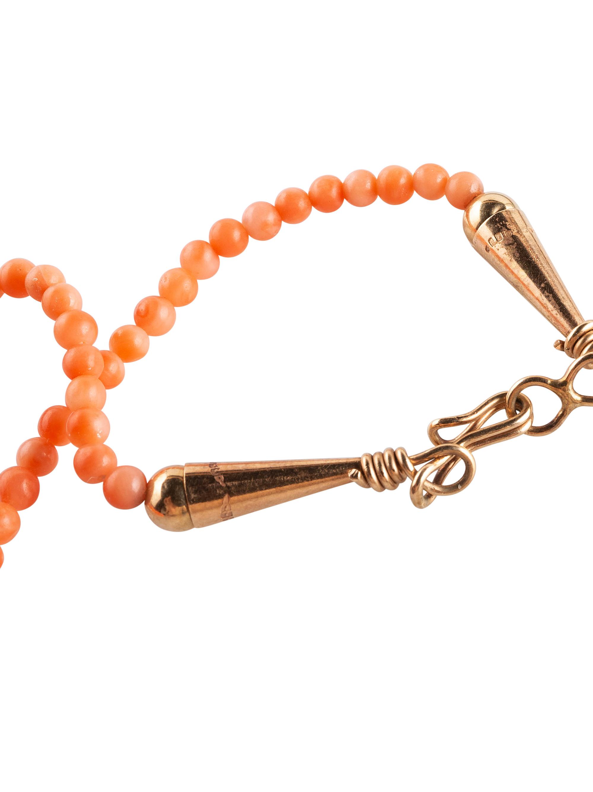 Single-strand Coral Necklace, with Sugilite Fetishes and Gold Findings