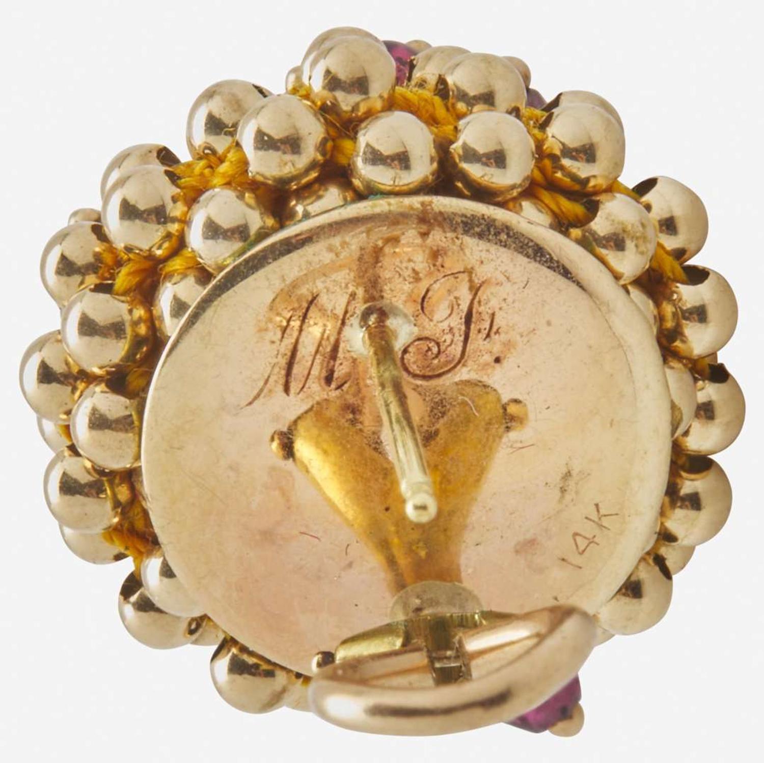 A Matching Set of Garnet and 14K Yellow Gold Bracelets and Earrings