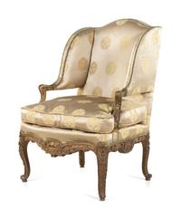 A Louis XV Style Carved and Giltwood Fauteuil à Oreilles