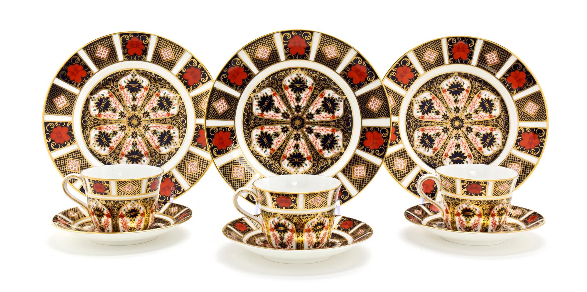 A Royal Crown Derby Porcelain Partial Dinner Service, Diameter of plate 9 inches.