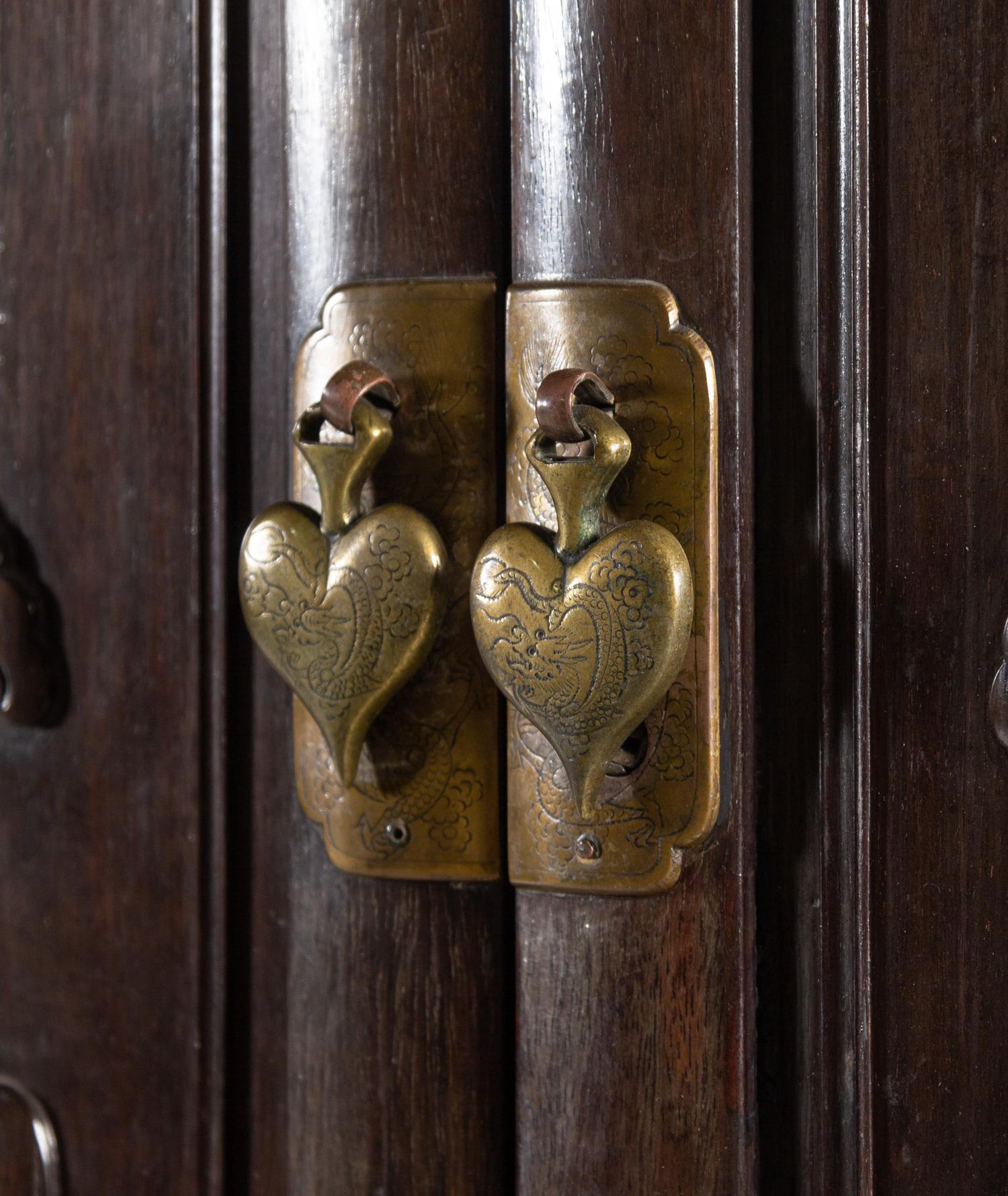 A Pair of Chinese Export Carved Hardwood Cabinets