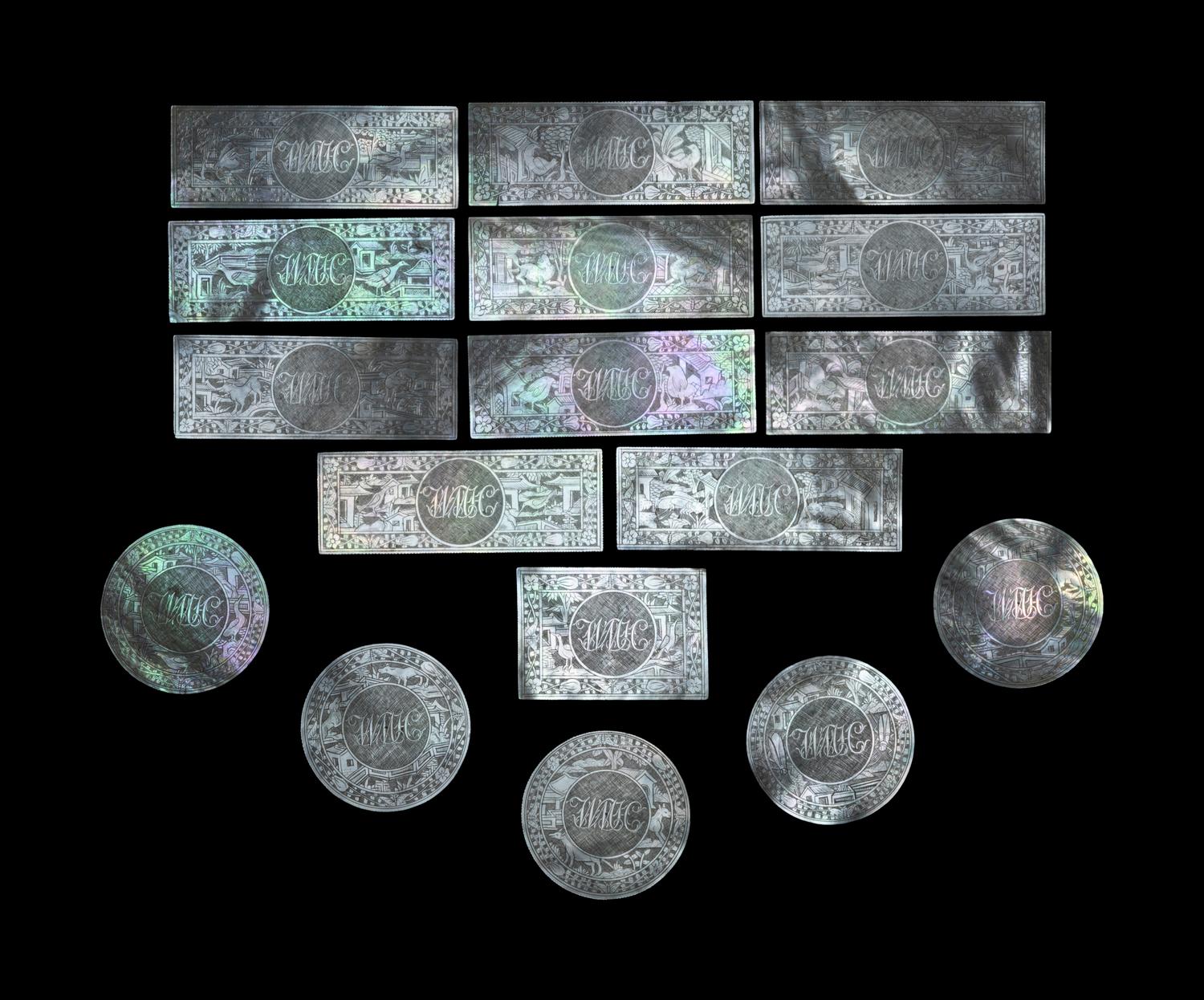 Seventeen Carved Mother-of-Pearl Game Pieces