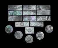 Seventeen Carved Mother-of-Pearl Game Pieces