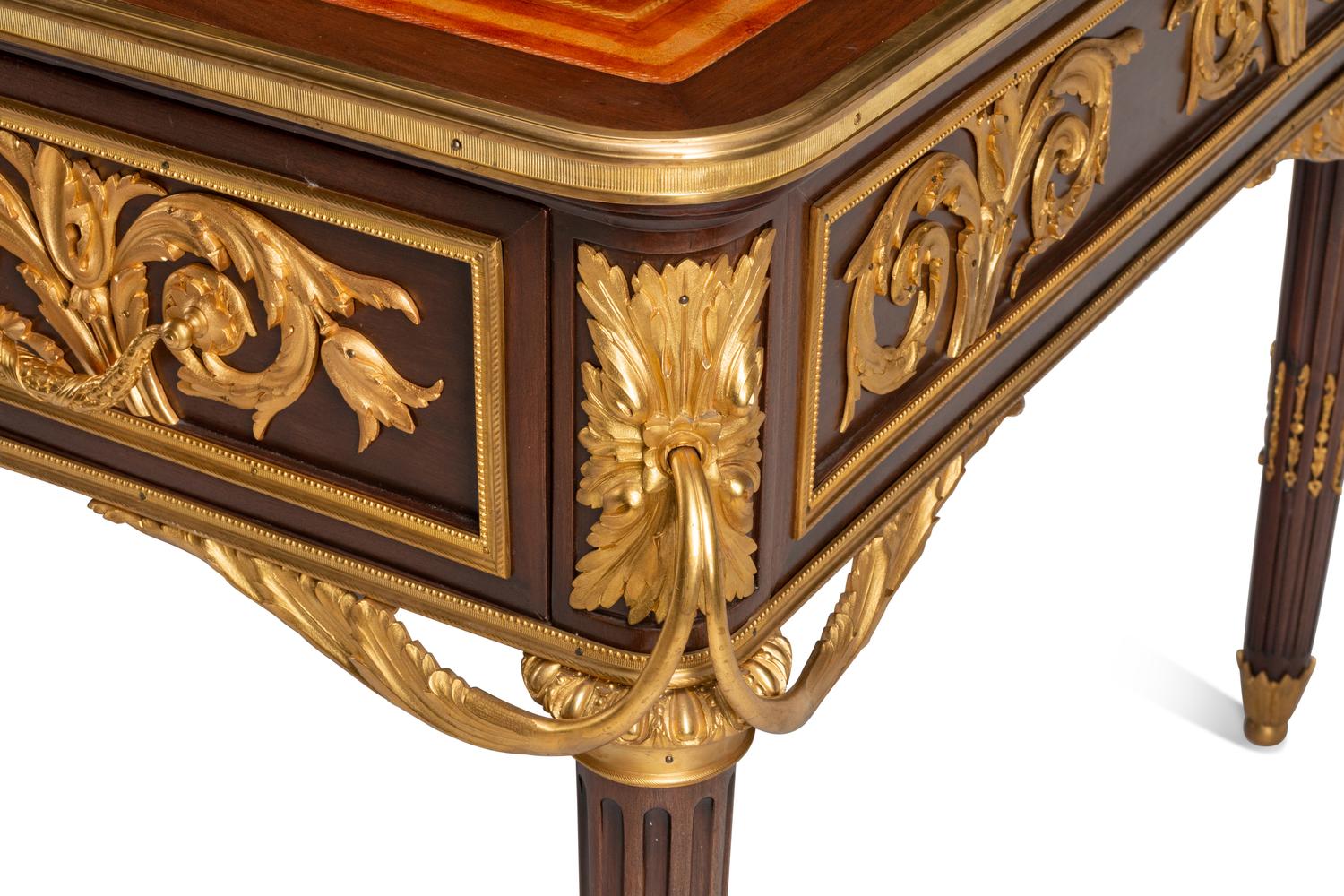 A Louis XVI Style Gilt Bronze Mounted Mahogany Bureau Plat