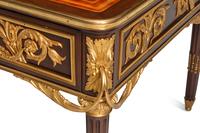 A Louis XVI Style Gilt Bronze Mounted Mahogany Bureau Plat