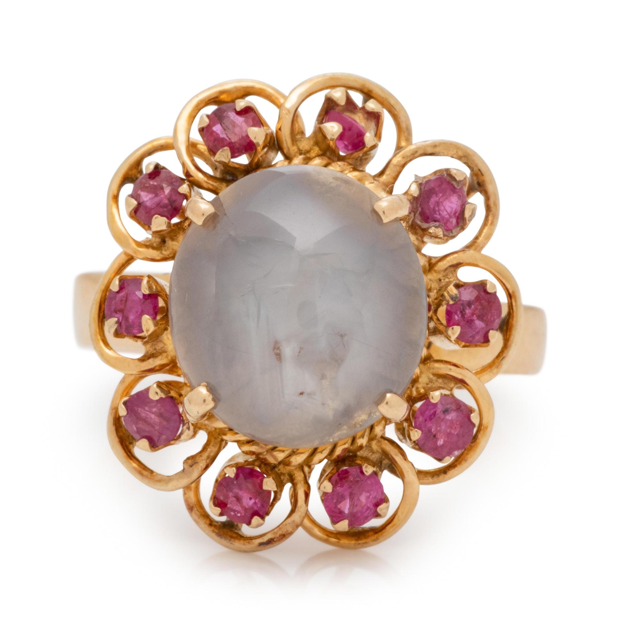 An 18 Karat Yellow Gold, Star Sapphire and Ruby Ring,