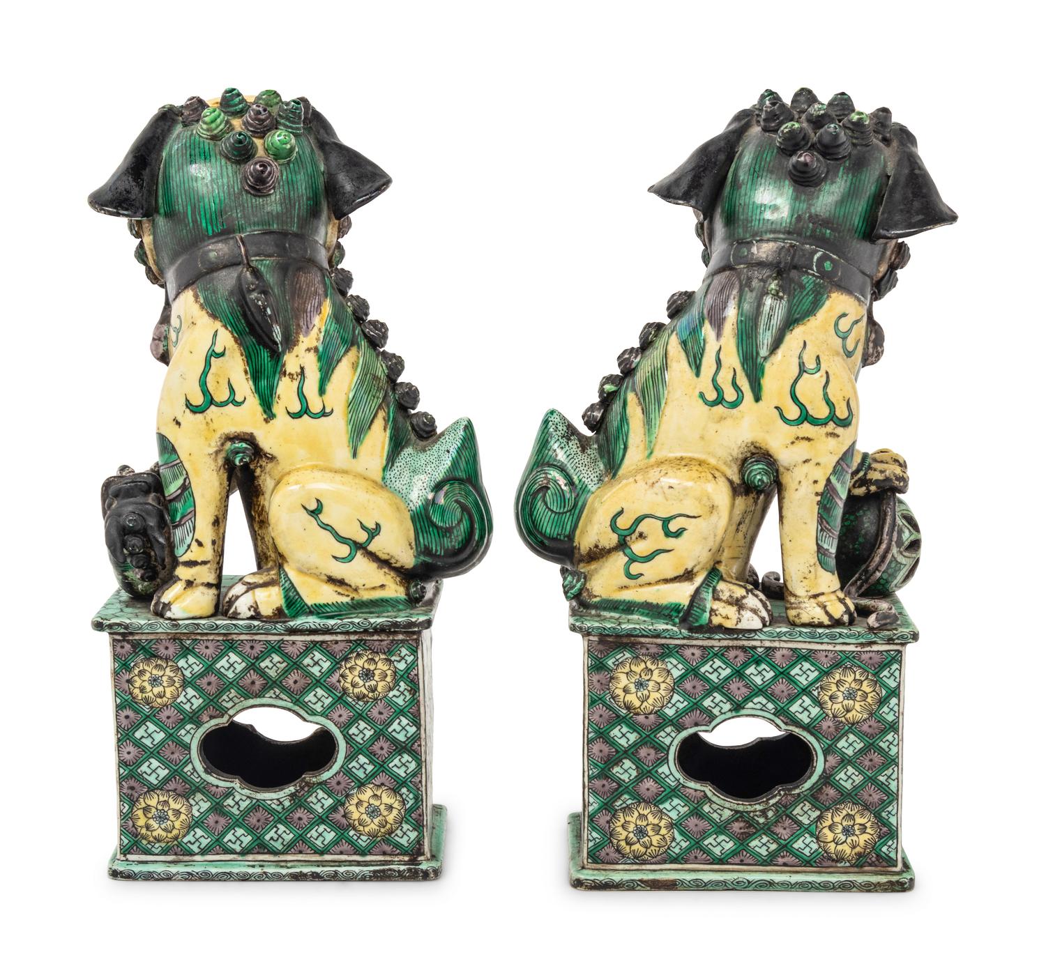 A Pair of Chinese Famille Verte Porcelain Figures of Fu Lions
