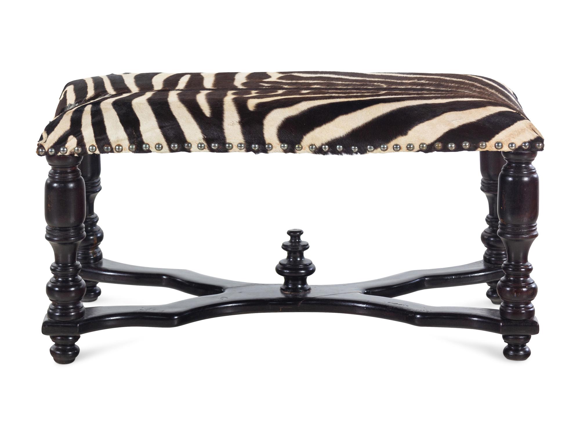 A William IV Ebonized Wood Zebra Hide Upholstered Bench