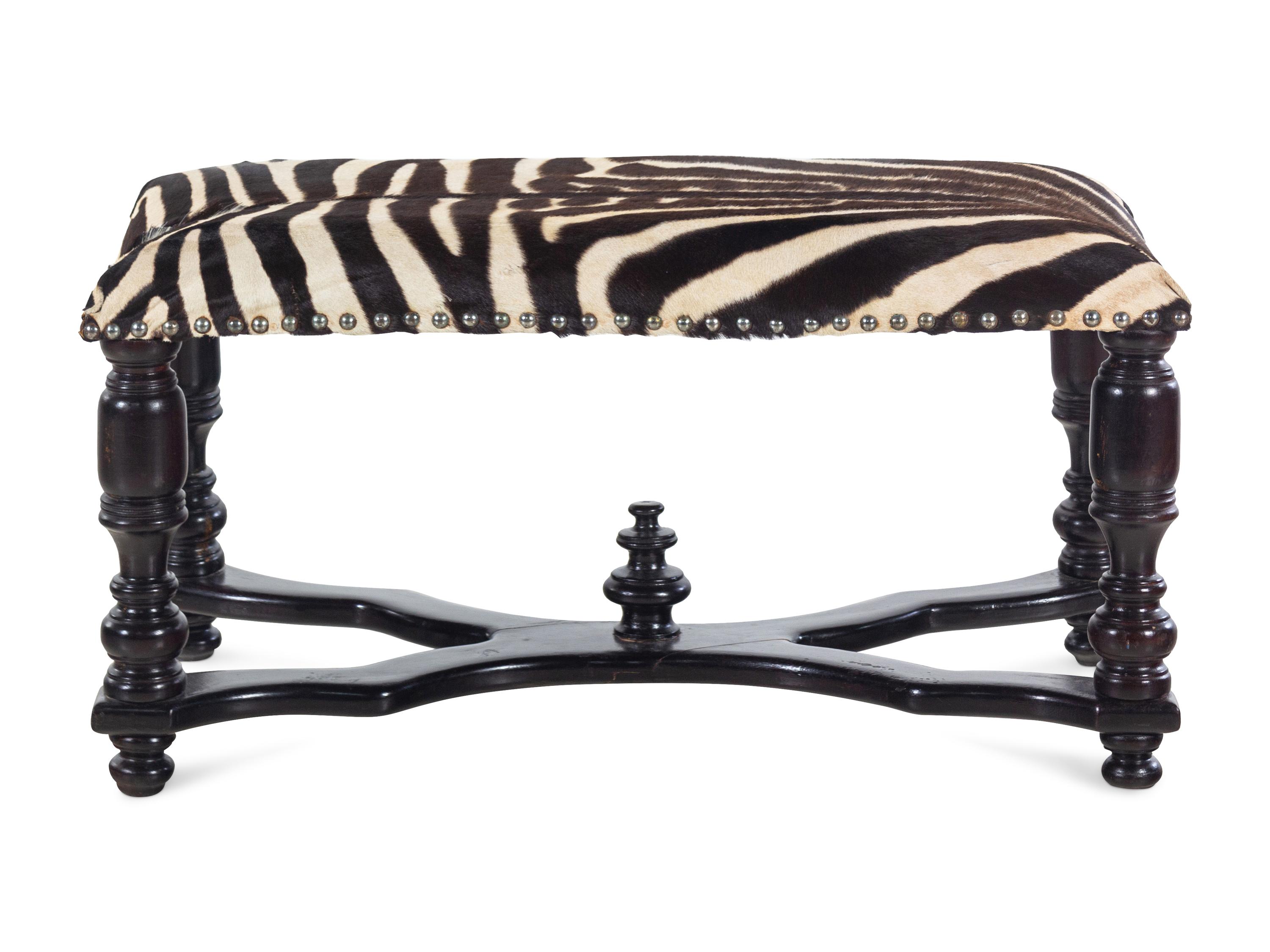 A William IV Ebonized Wood Zebra Hide Upholstered Bench