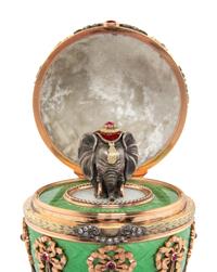 A Gold, Guilloché Enamel and Gemstone-Mounted Surprise Egg
