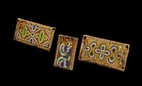 Three Rhenish Champlevé and Gilt Copper Framing Plaques