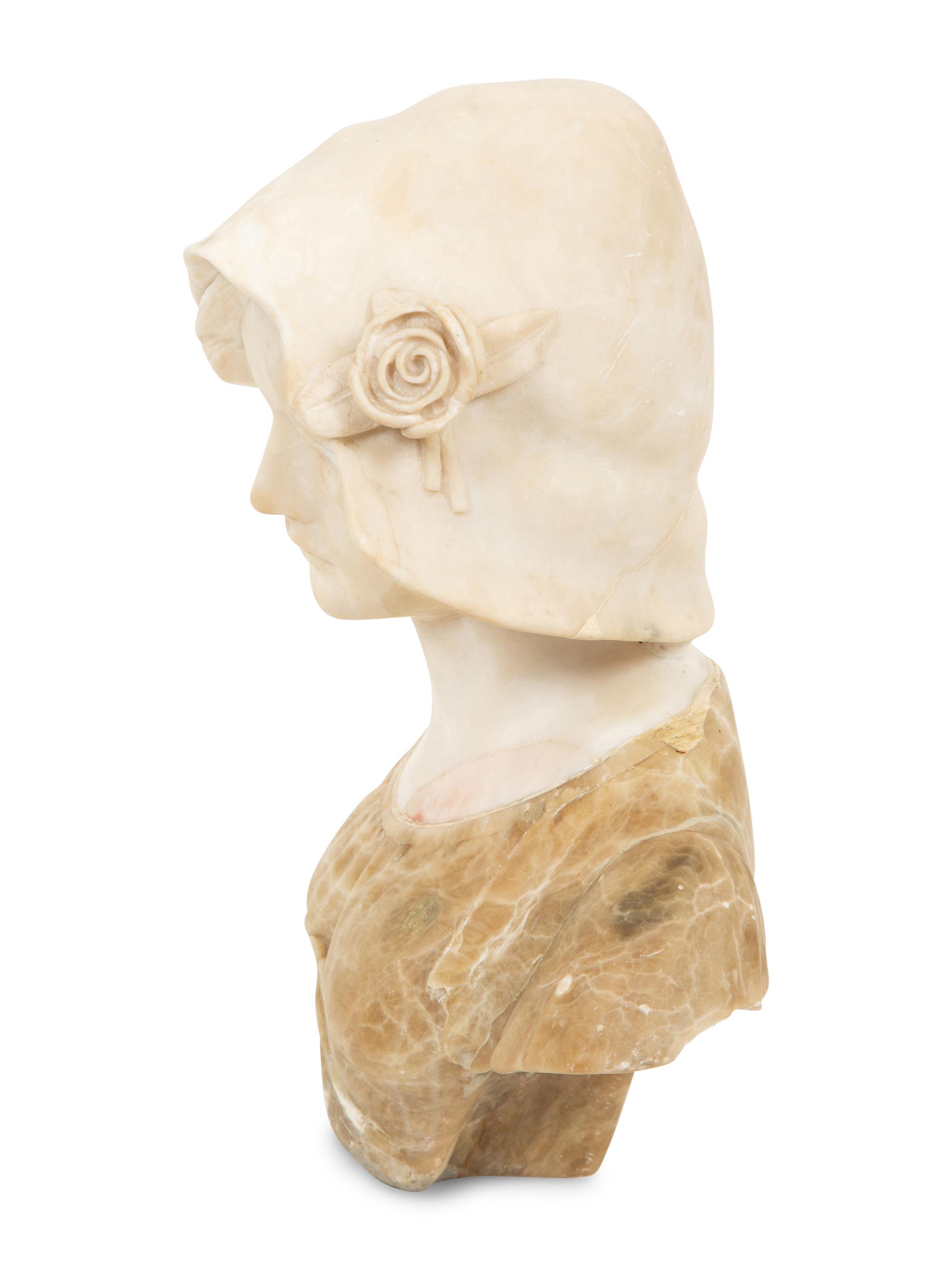 A Continental Carved Alabaster Bust of a Young Maiden