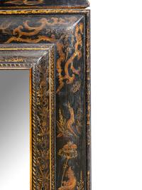 A North Italian Black Japanned Cushion Mirror