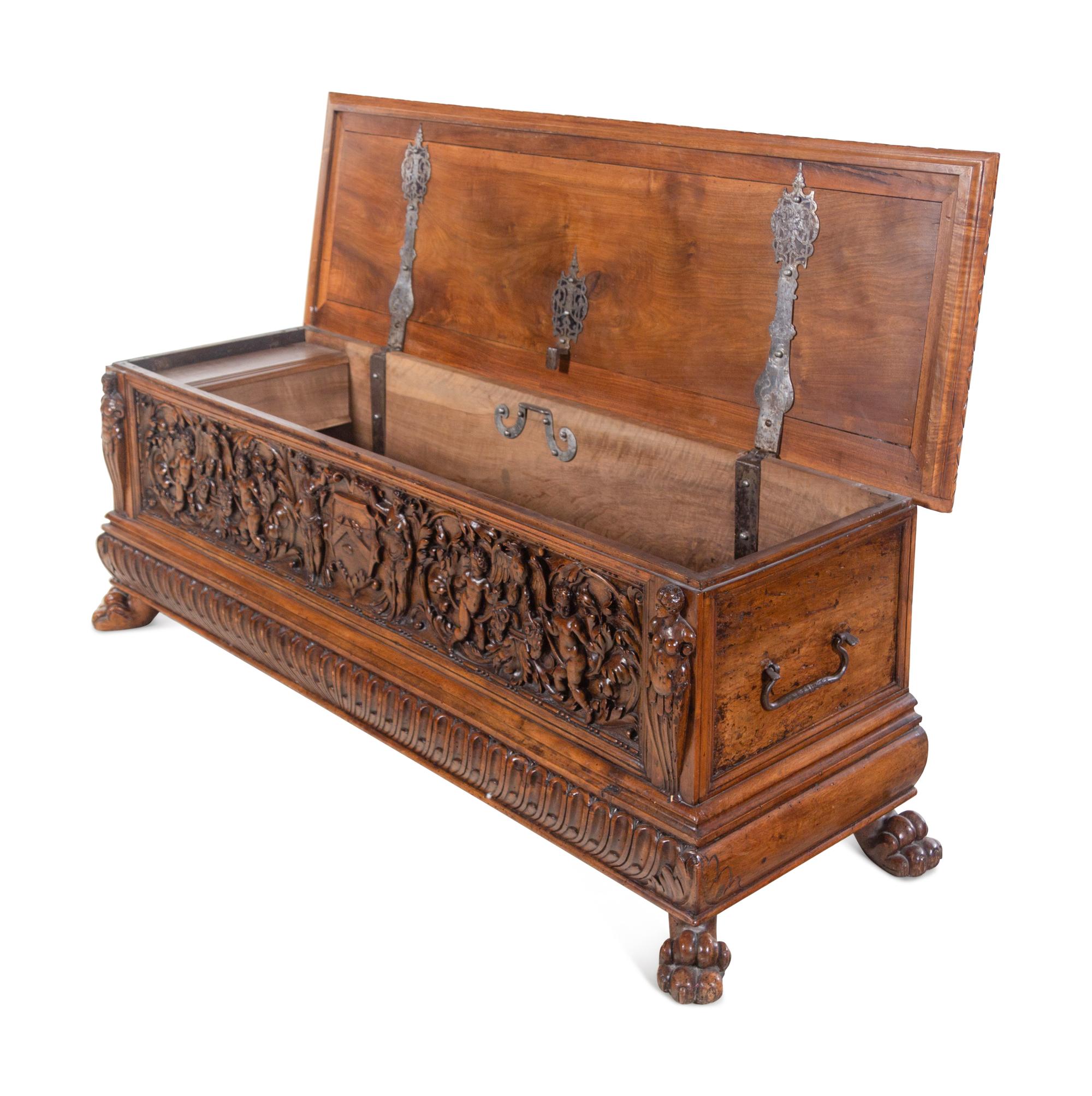 An Italian Carved Walnut Cassone