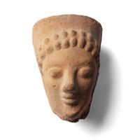 A Greek Terracotta Face Fragment