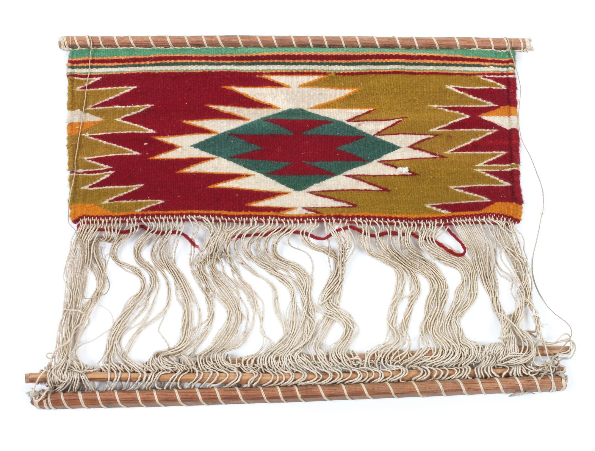 Three Navajo Weavings on Looms Height of largest loom 27 x width 43 3/4 inches.