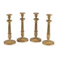 A Set of Four Charles X Style Gilt Bronze Candlesticks