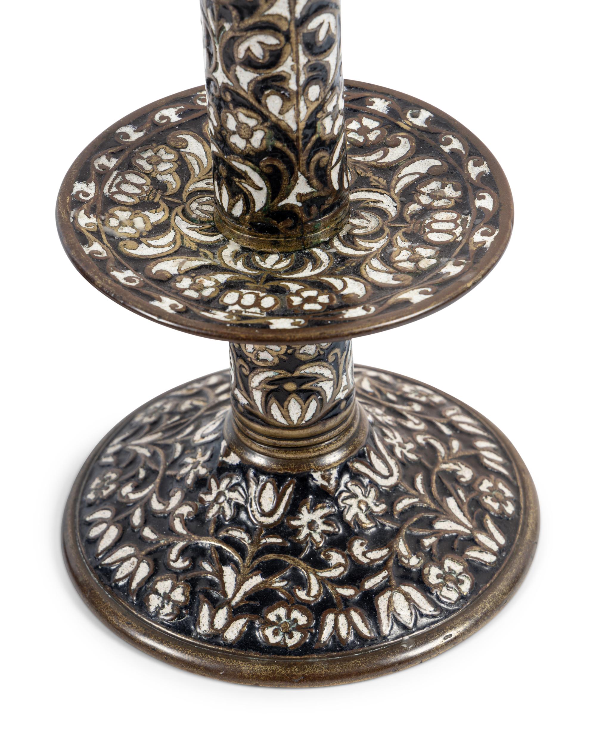 A Pair of Cast Brass 'Surrey Enamel' Candlesticks