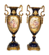 A Pair Gilt Metal Mounted Sèvres Style Porcelain Urns