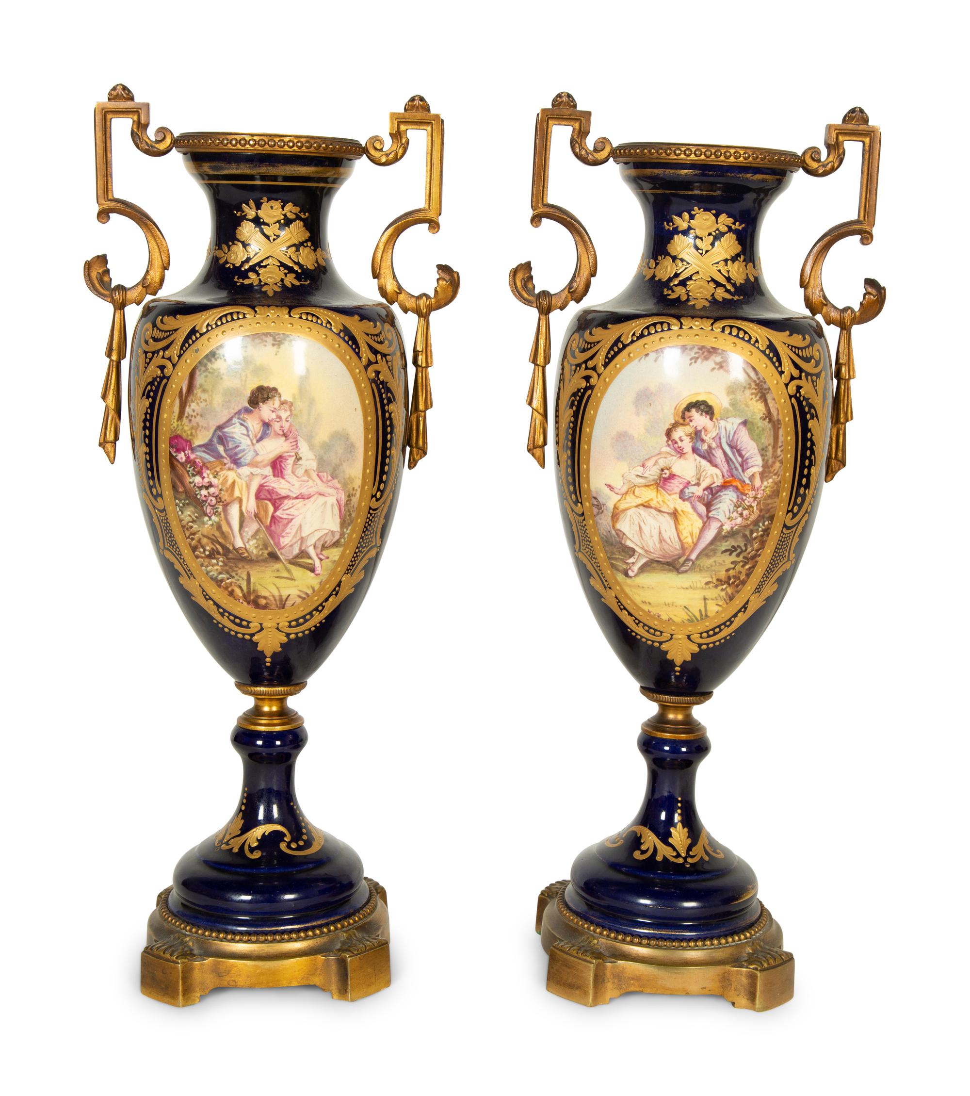 A Pair Gilt Metal Mounted Sèvres Style Porcelain Urns