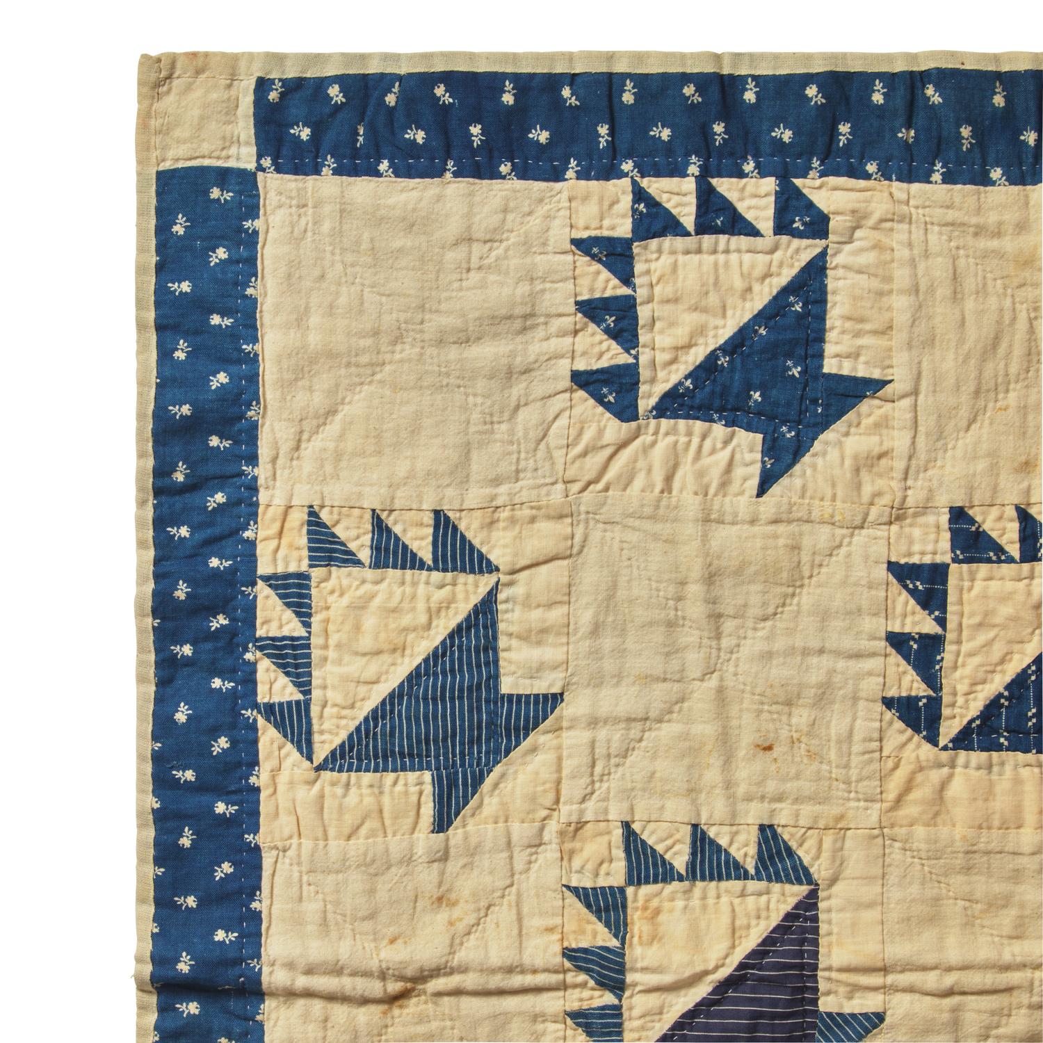 A Pieced Cotton Blue and White "Berry Baskets" Crib Quilt