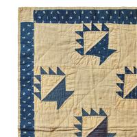 A Pieced Cotton Blue and White "Berry Baskets" Crib Quilt