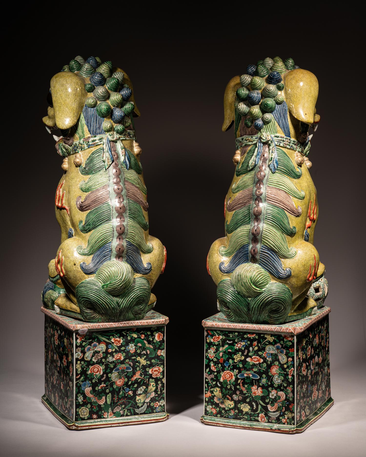 A Large Pair of Chinese Famille Verte Porcelain Figures of Fu Lions