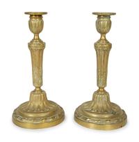 A Pair of Continental Brass Candlesticks