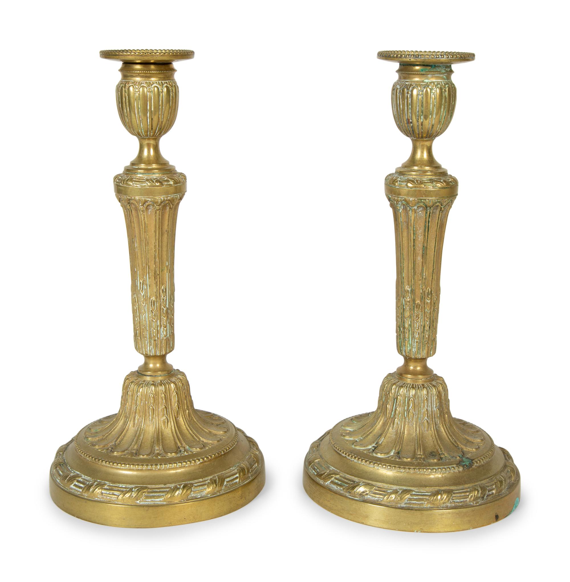 A Pair of Continental Brass Candlesticks