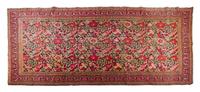 A Continental Wool Rug 15 feet 2 inches x 6 feet 9 inches.