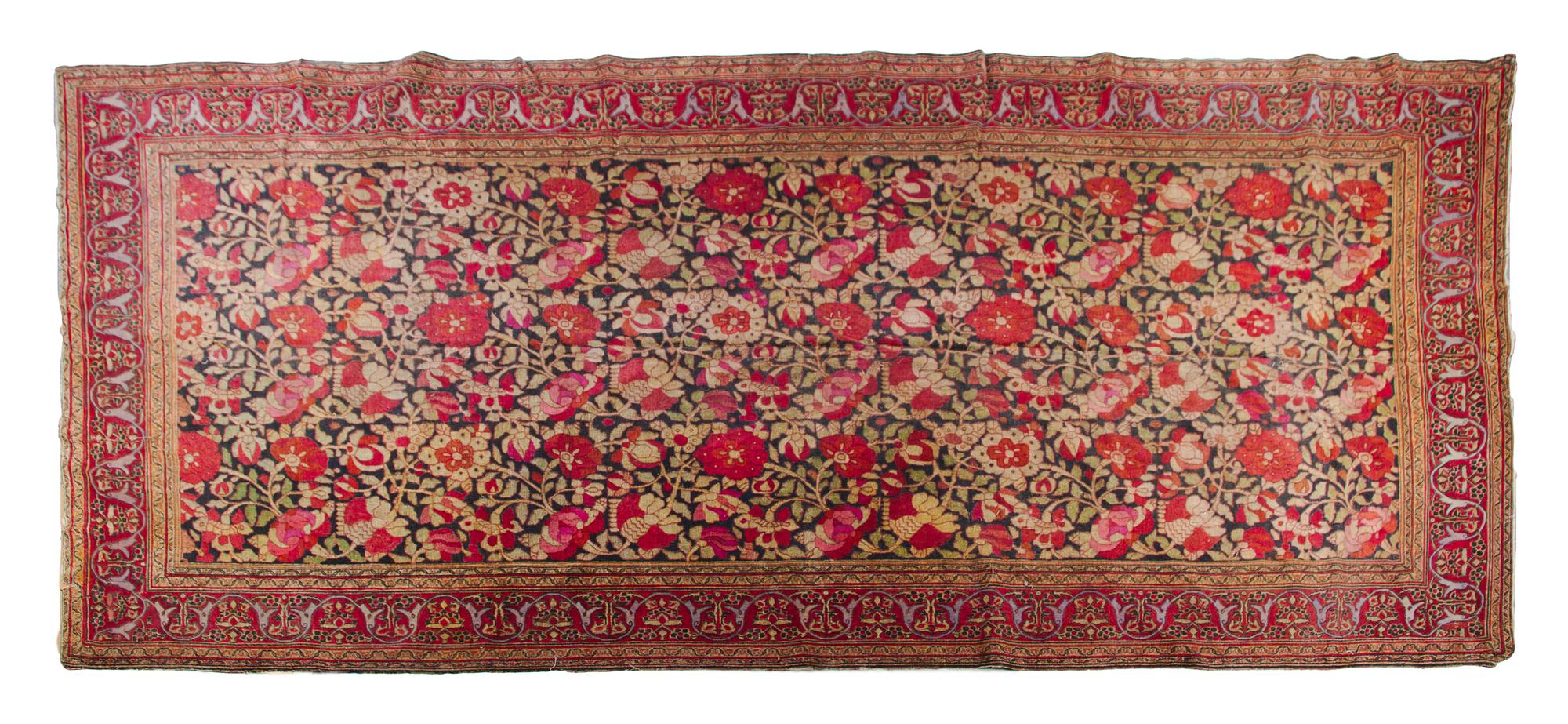 A Continental Wool Rug 15 feet 2 inches x 6 feet 9 inches.