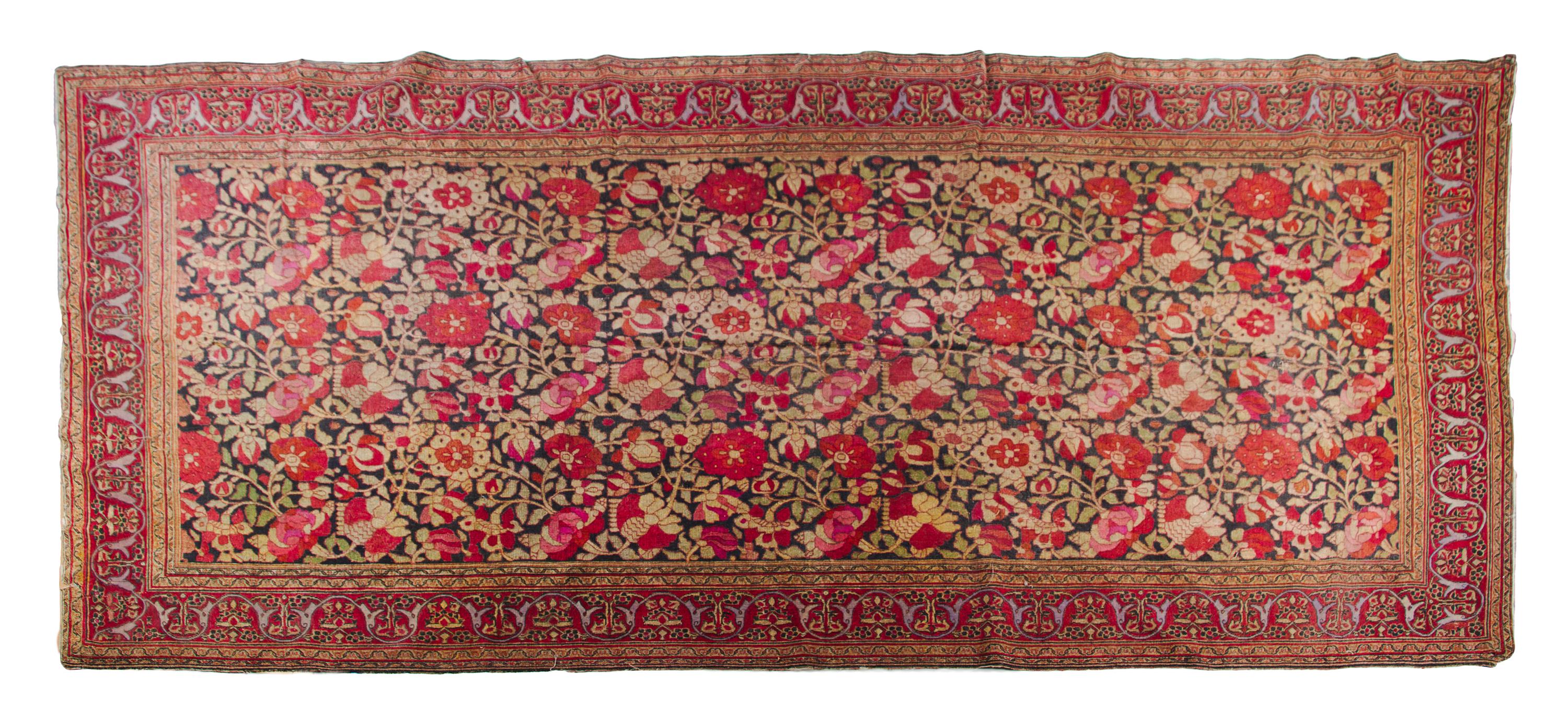 A Continental Wool Rug 15 feet 2 inches x 6 feet 9 inches.