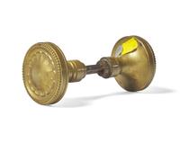 A Brass Doorknob with Inset Wedgwood Jasperware Medallion