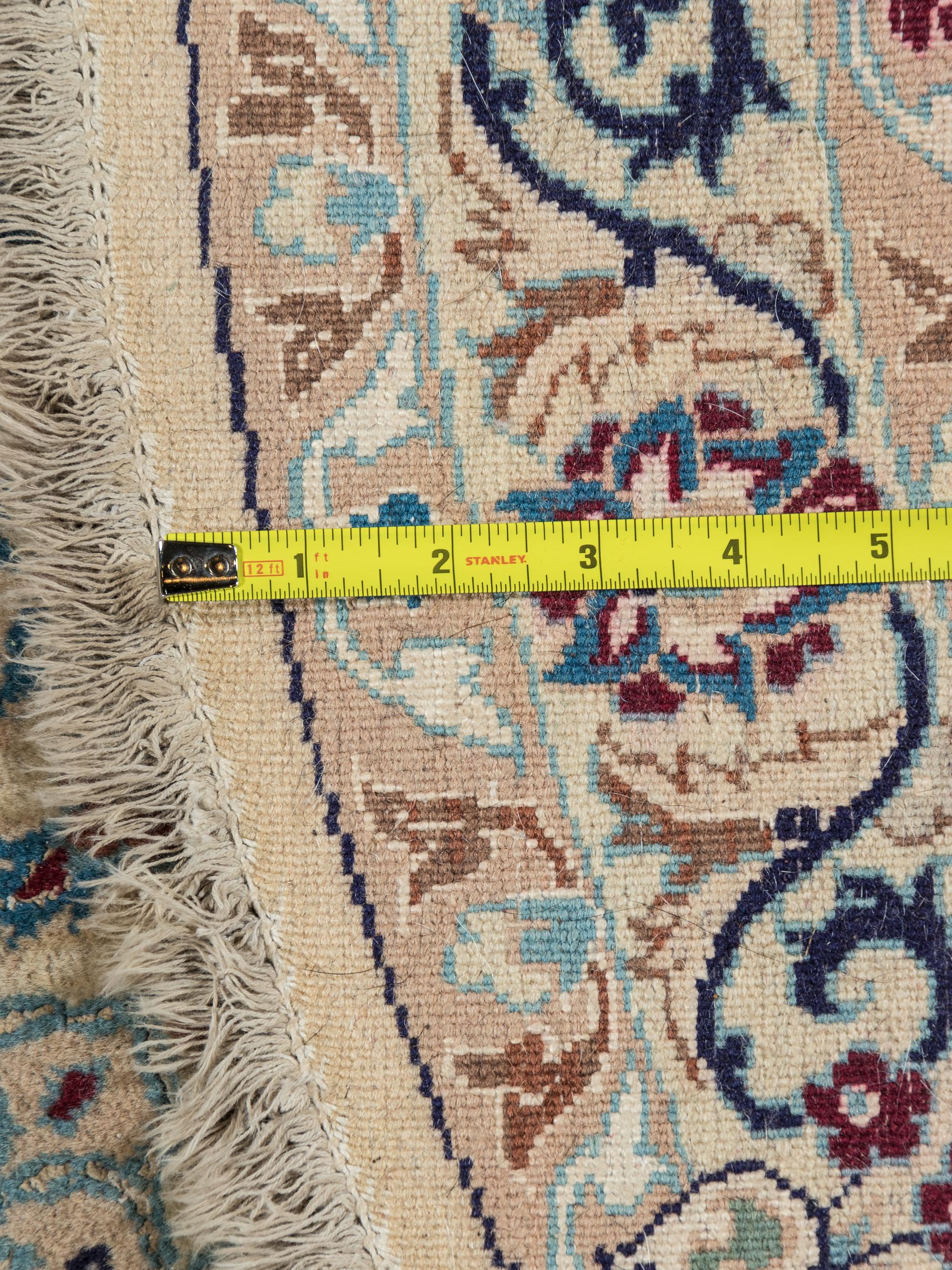 A Persian Nain Wool Circular Rug
