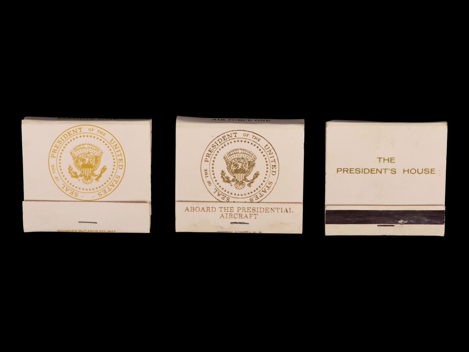 (Politics) : A group of 3 matchbooks from Marine One, Air Force One, and “The President’s House.”